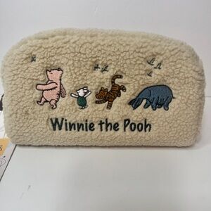 NWT. Winnie The Pooh cosmetic makeup bag. faux sherpa fleece soft Bag